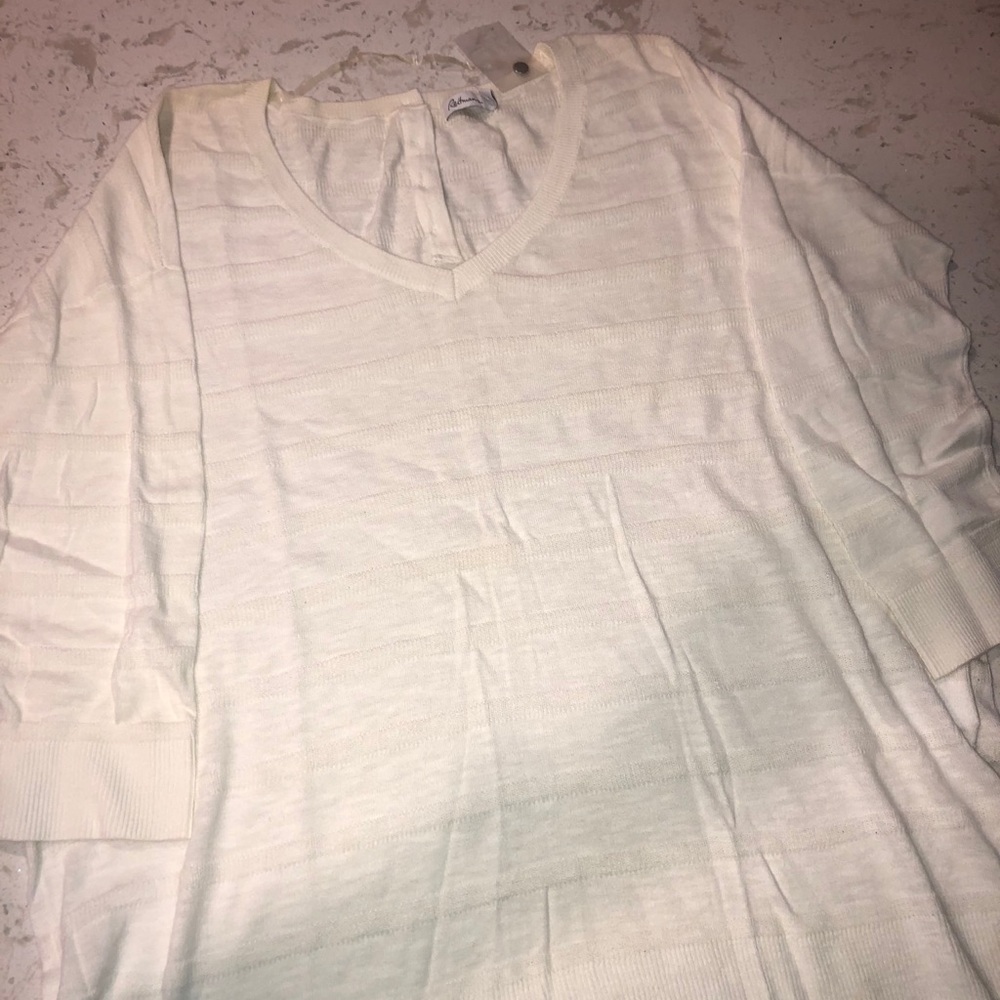 Laying Short Sleeve Sweater